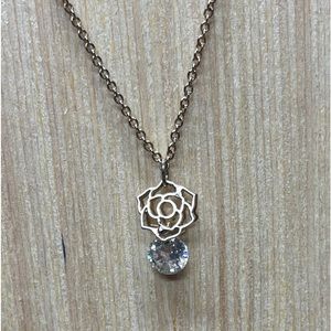 Gold and diamond rose shaped necklace